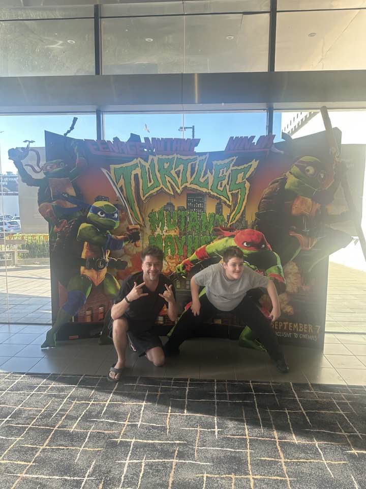 Brendan and his son Logan at an early screening of Teenage Mutant Ninja Turtles Mutant Mayhem.